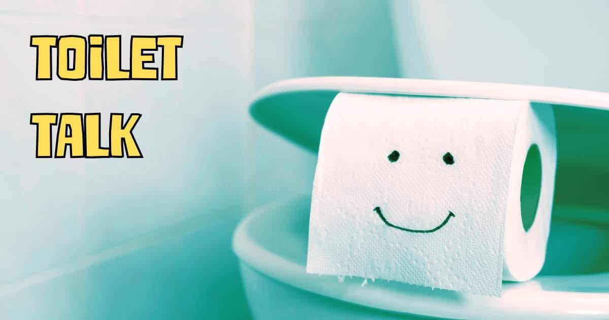 Toilet paper roll with a smiley face drawn on it, sitting on a toilet with the yellow text "TOILET TALK"