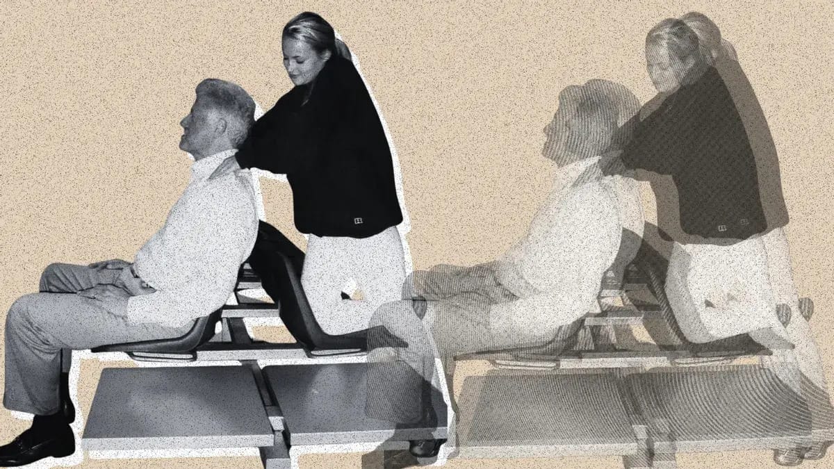 An image shows a white woman massagging a white man's shouldars from behind.