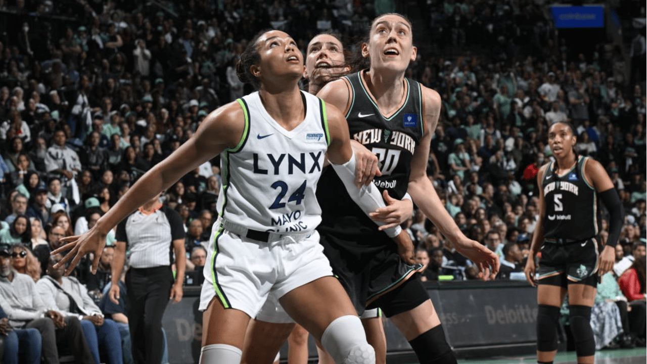 Napheesa Collier #24 of the Minnesota Lynx and Breanna Stewart #30 of the New York Liberty waits for a rebound during Game 5 of the WNBA Finals on October 20, 2024 in Brooklyn, New York.