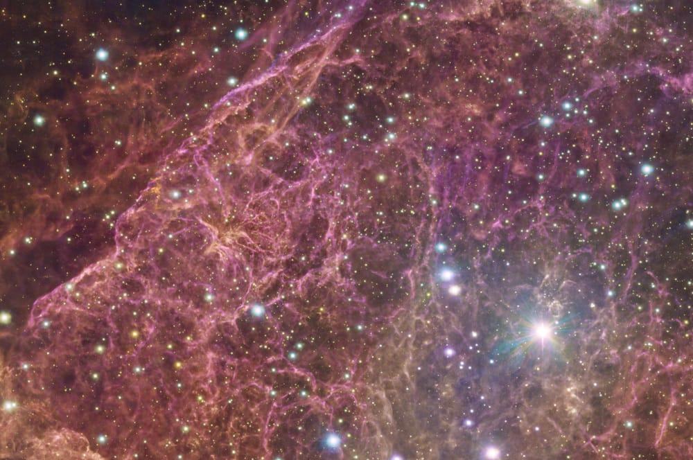 Detail from the image showing stars and finer structures in the filaments.