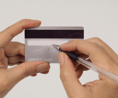 Sign back of credit card