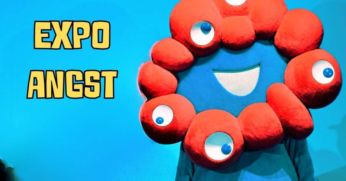 Osaka Expo 2025 red mascot with multiple eyes representing expo anxiety and visitor confusion