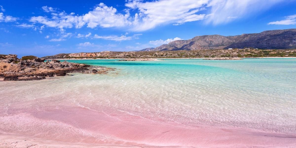 pink sand beach and teal waters on Crete