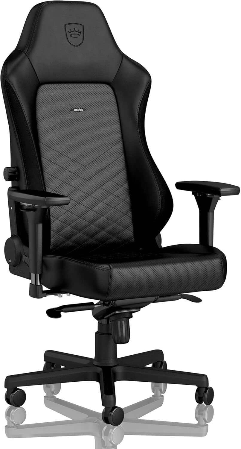 Noblechairs Hero – Professional Meets Play A sleek, understated gaming and office chair with firm support, real upholstery, and an ergonomic lumbar adjustment dial for polished setups.