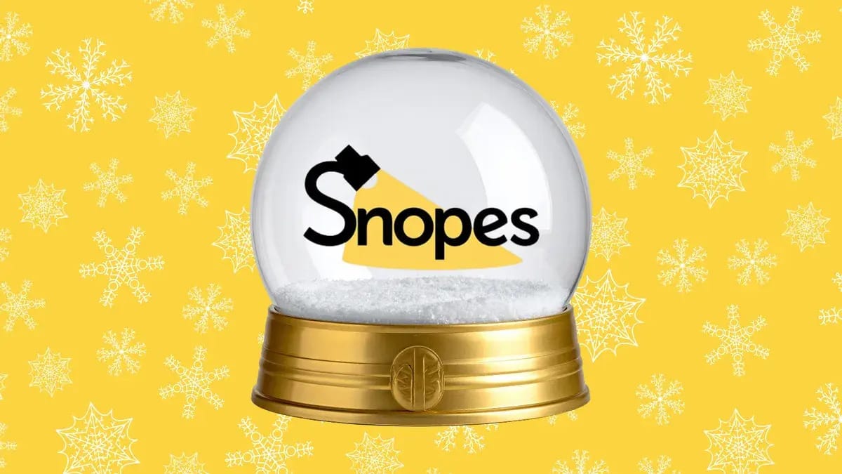 A snow globe is pictured. A black word that says Snopes with yellow "light" going through can be seen in the middle.