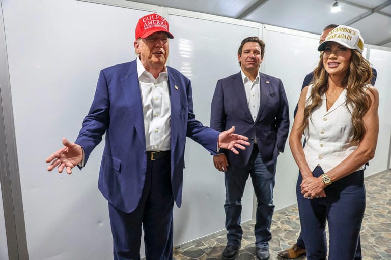 President Donald Trump, Governor Ron DeSantis, and DHS Secretary Kristi Noem