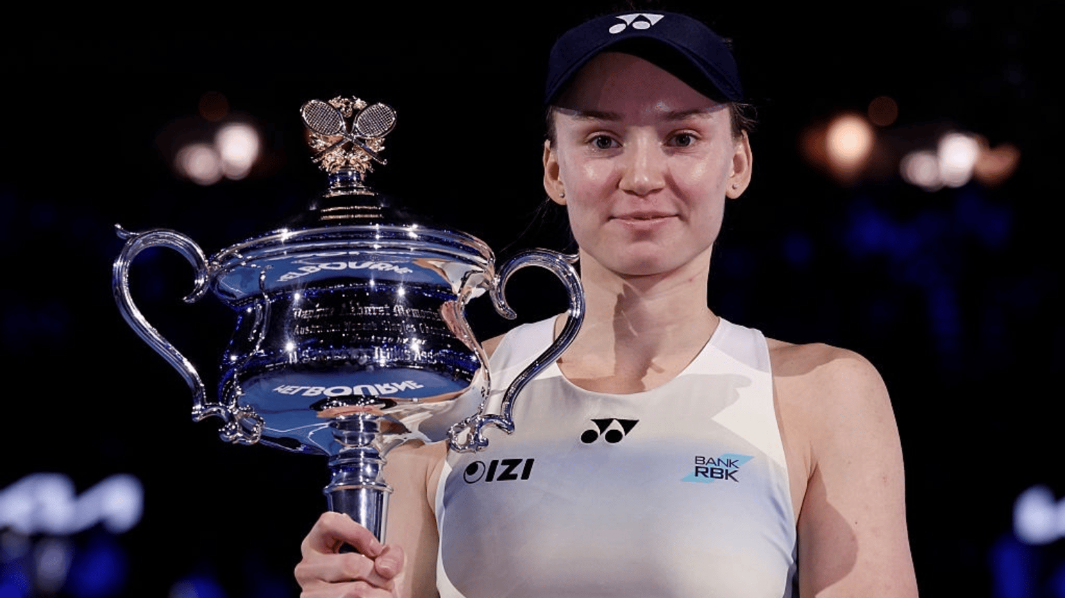 Elena Rybakina of Kazakhstan poses with the Daphne Akhurst Memorial Cup after her victory in the Women's Singles Final