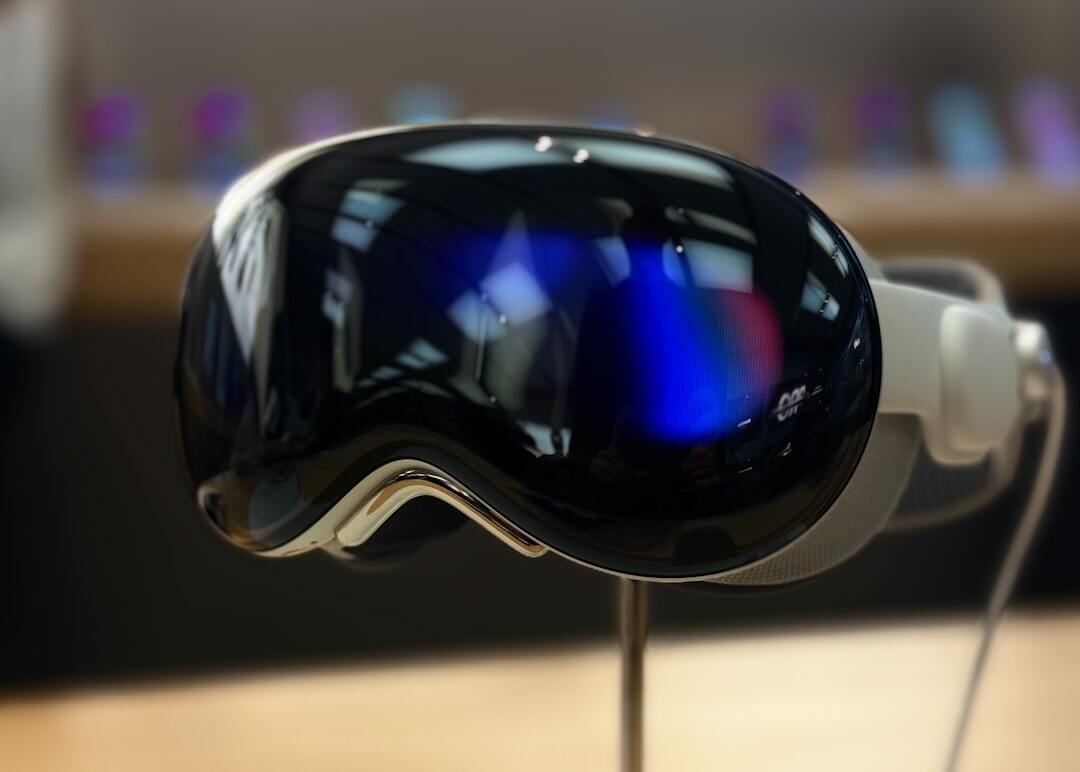 The Apple Vision Pro powered on and on display.