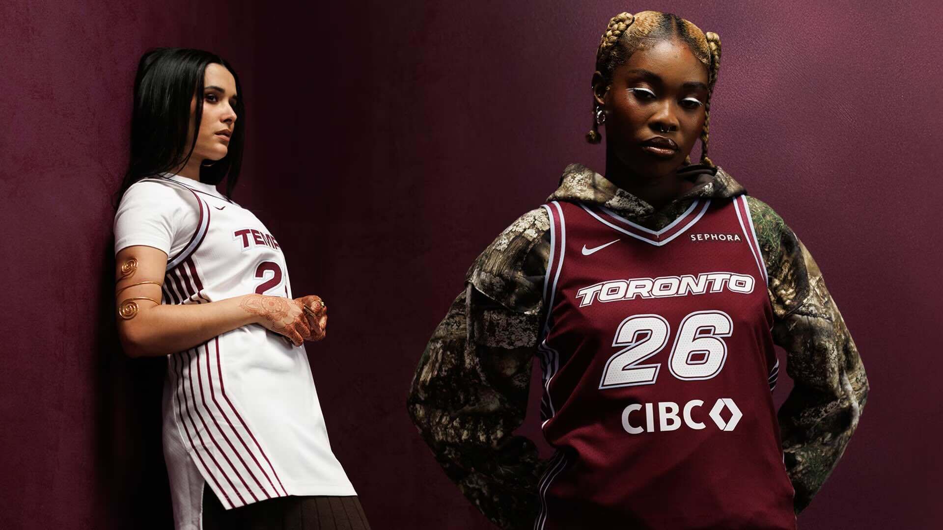 Two models wear Toronto Tempo jerseys against a maroon backdrop.