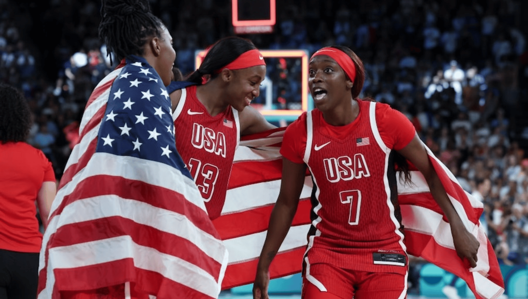 Chelsea Gray #8 of Team USA, Jackie Young #13 of Team USA and Kahleah Copper #7 of Team USA celebrate the victory of the Women's Gold Medal game