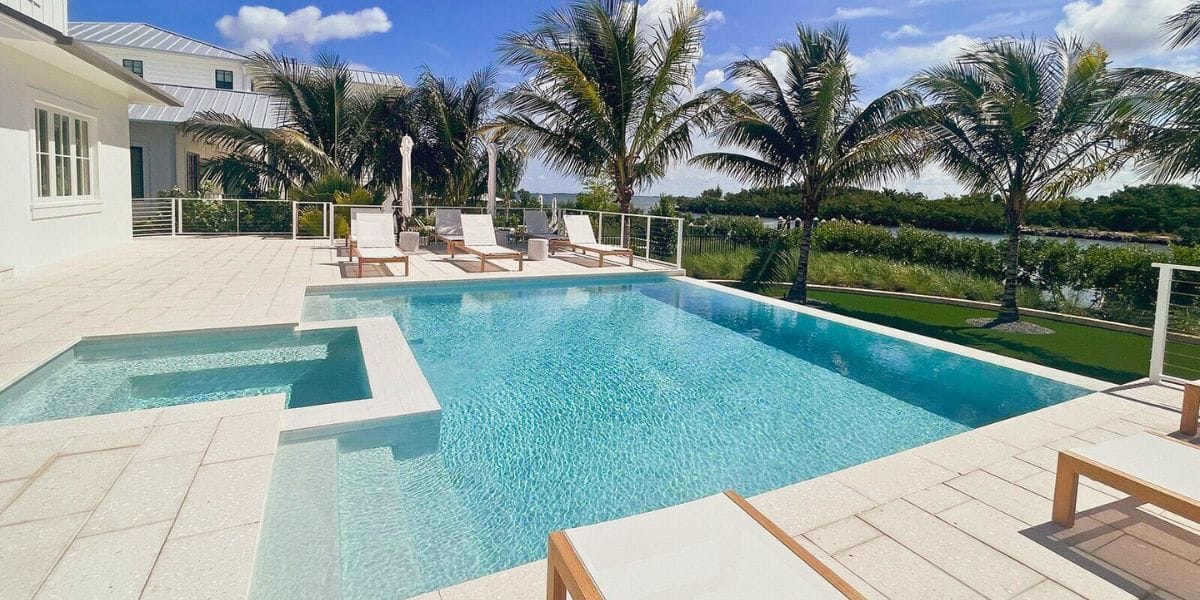 beautiful pool in a house with palm trees