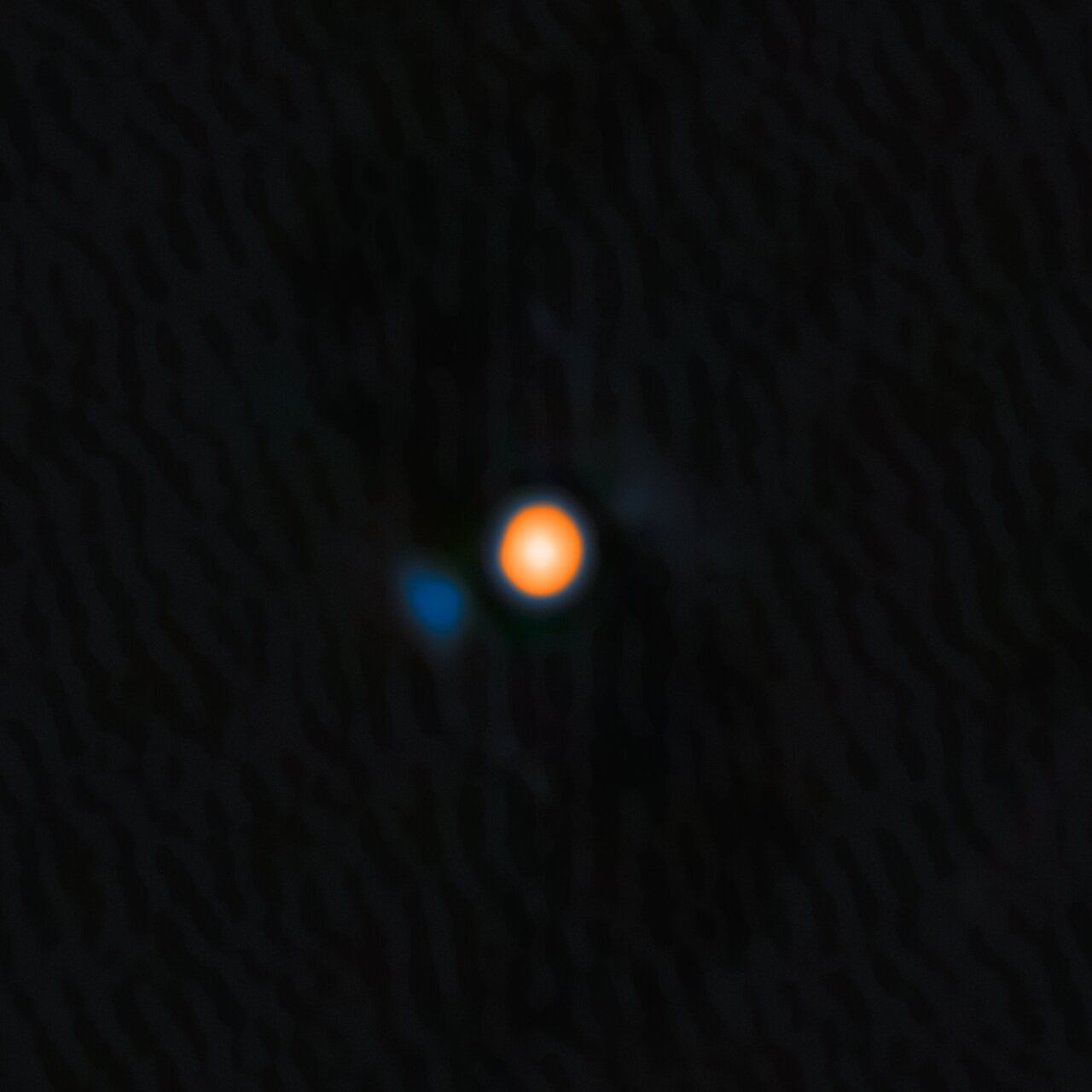 Astronomers using the Gemini North telescope in Hawai‘i have directly imaged a long-predicted companion star orbiting Betelgeuse, resolving a centuries-old mystery about the red supergiant’s brightness fluctuations. The faint, hot companion lies deep within Betelgeuse’s extended atmosphere and may explain its six-year variability cycle. Detected via speckle imaging with the ‘Alopeke instrument, the discovery marks the first confirmed close-in companion to a supergiant star. Researchers estimate the companion will spiral into Betelgeuse within 10,000 years. 