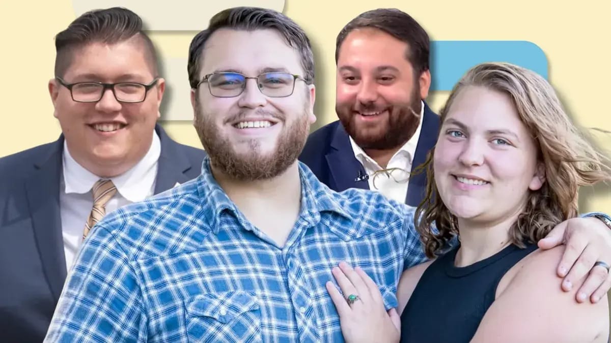 Four people are shown left to right. Three are men, while the on the far right is a woman. The man in the center (wearing a blue flannel) has his arm around the woman. The other two men appear to be wearing suits.