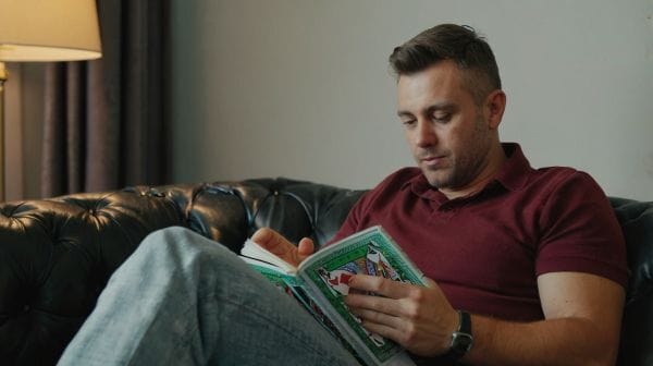 Player reading poker book