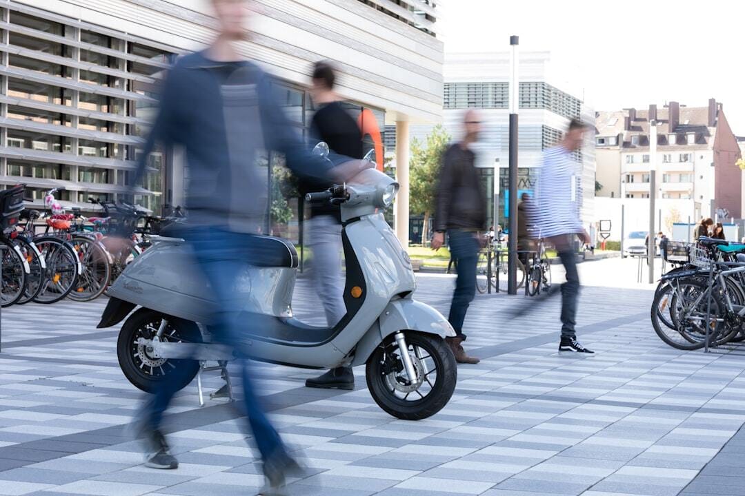 A long exposure shot showing the future of mobility: Electric scooters move you around fast whilst being economic and environmentally friendly. Meet the Kumpan 54 Ri - Up to 187 km on one charge, 100 km/h top speed and equipped with german hightech.