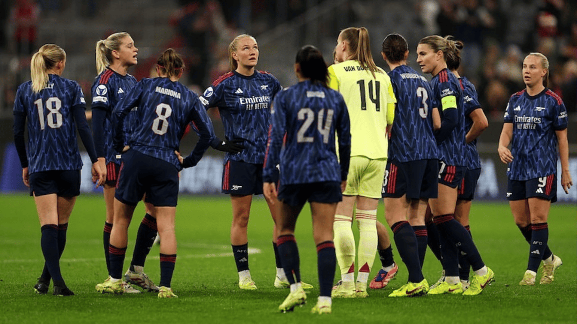 Frida Maanum and teammates of Arsenal look dejected after Glodis Perla Viggosdottir of Bayern Munich (not pictured) scores her sides third goal