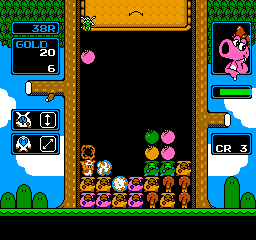 A screenshot showing some of the different enemy types in Wario’s Woods on the NES in action, with a sidebar on the left part of the screen signaling that you need to use diagonal clears to get rid of one of the types.