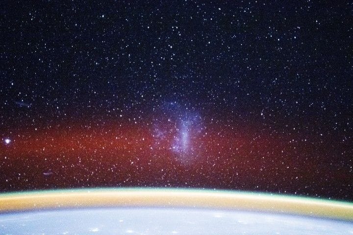 The Large Magellanic Cloud (LMC) photographed from the International Space Station, located about 160,000 light-years away, is an irregular dwarf galaxy consisting of billions of stars.