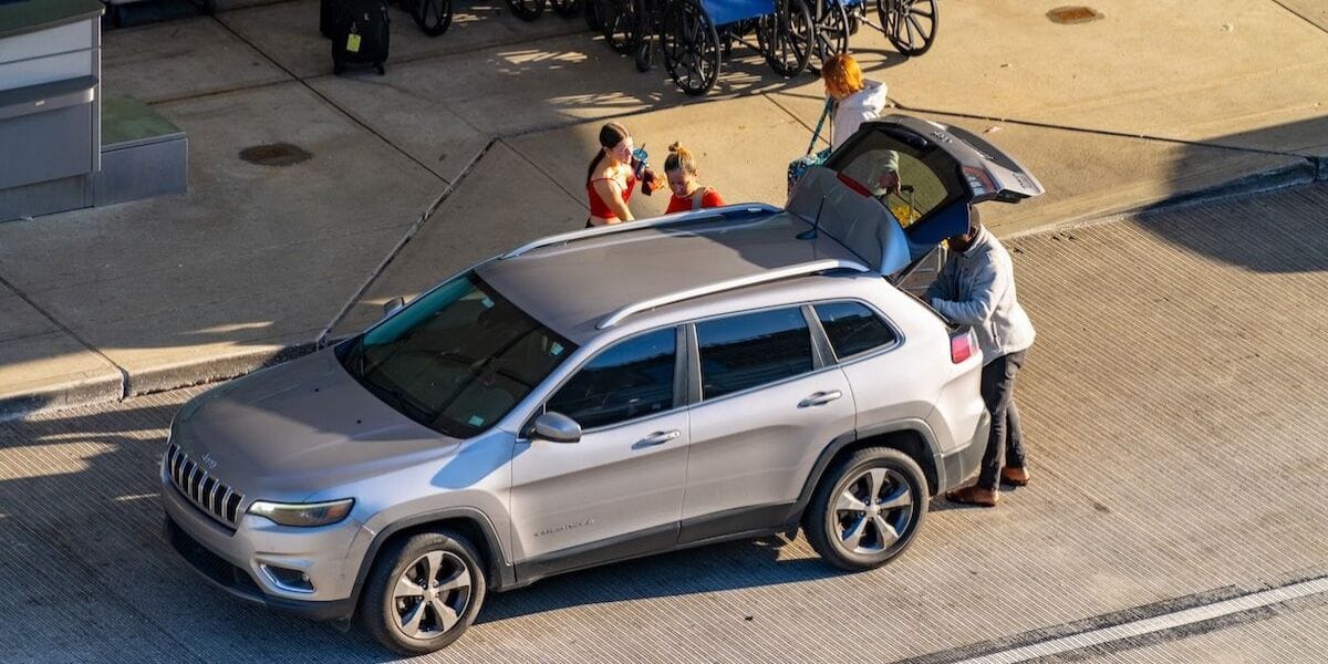 people getting into a car