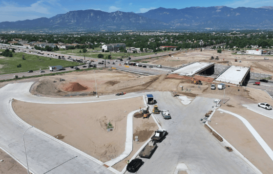 Looking southwest over the new diverging diamond interchange under construction at Powers Boulevard and Airport Road