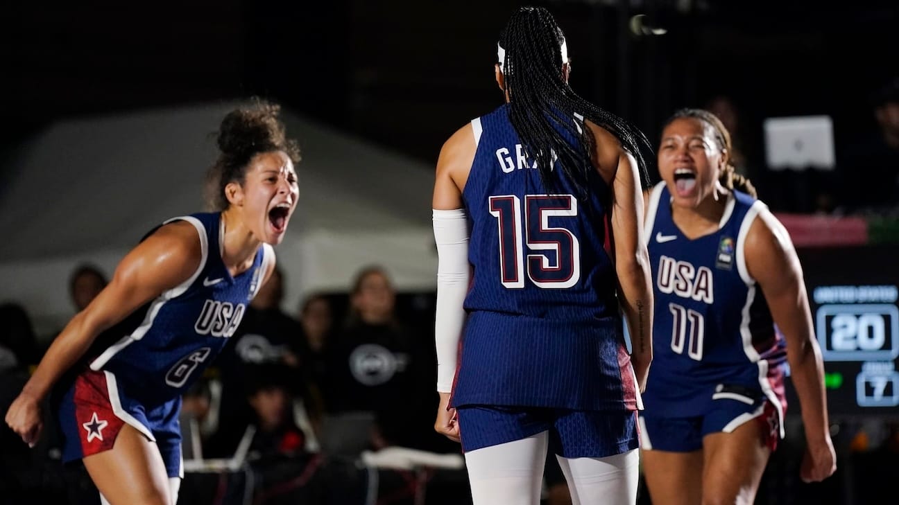 Team USA 3x3 celebrates after winning a game.