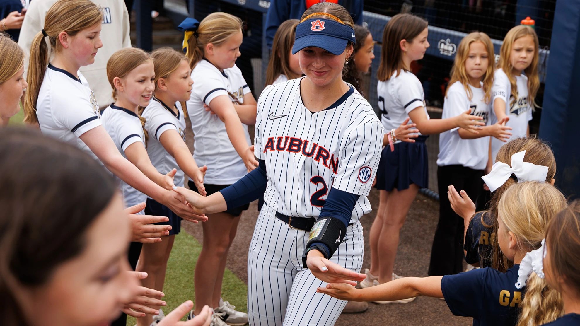 Alyssa Hastings greeting kids