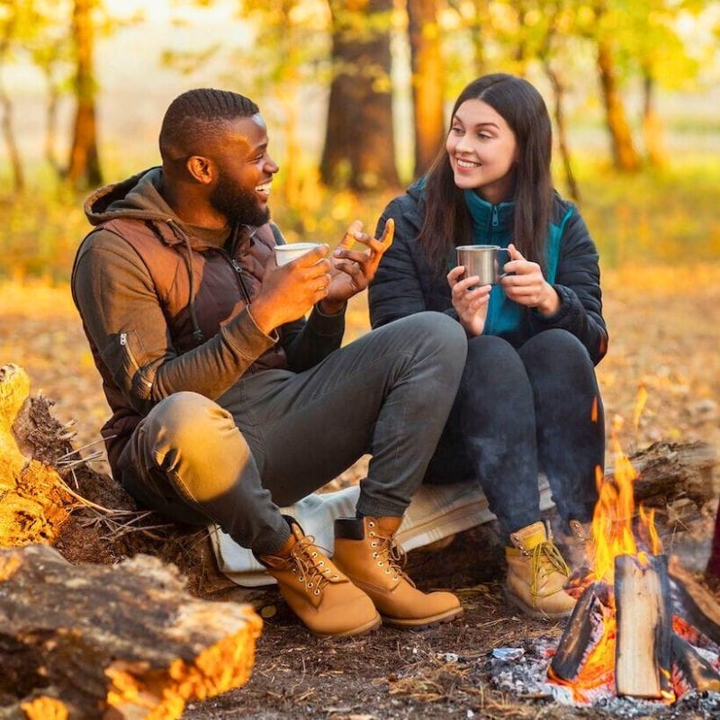 cozy camping by a fire