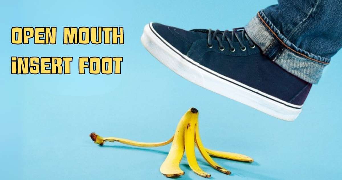 A foot in sneakers about to step on a banana peel, with bold yellow text reading “OPEN MOUTH INSERT FOOT