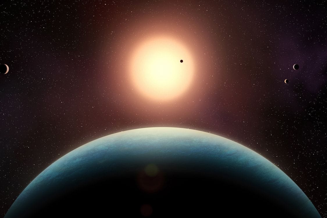 An artists' illustration of the planetary system of L 98-59. Five small exoplanets orbit closely around this red dwarf star, located 35 light-years away. In the foreground is the habitable-zone super-Earth L 98-59 f, whose existence was conùfirmed in this study. (Credit: Benoit Gougeon, Université de Montréal)