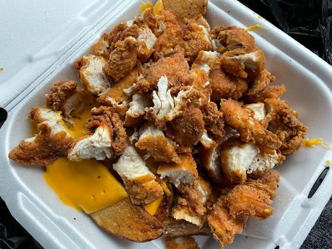 Plates of hearty and delicious food from Black-owned establishments in Jacksonville.