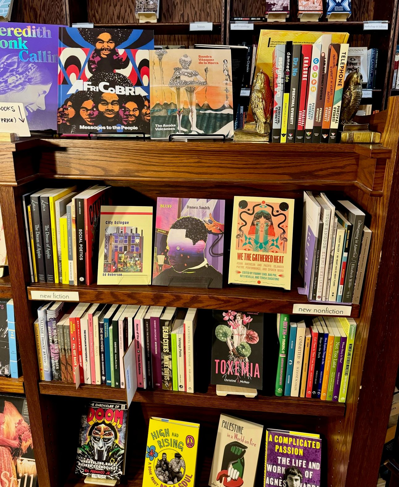 Bookcase featuring several face-out displays and new poetry, fiction, and nonfiction.