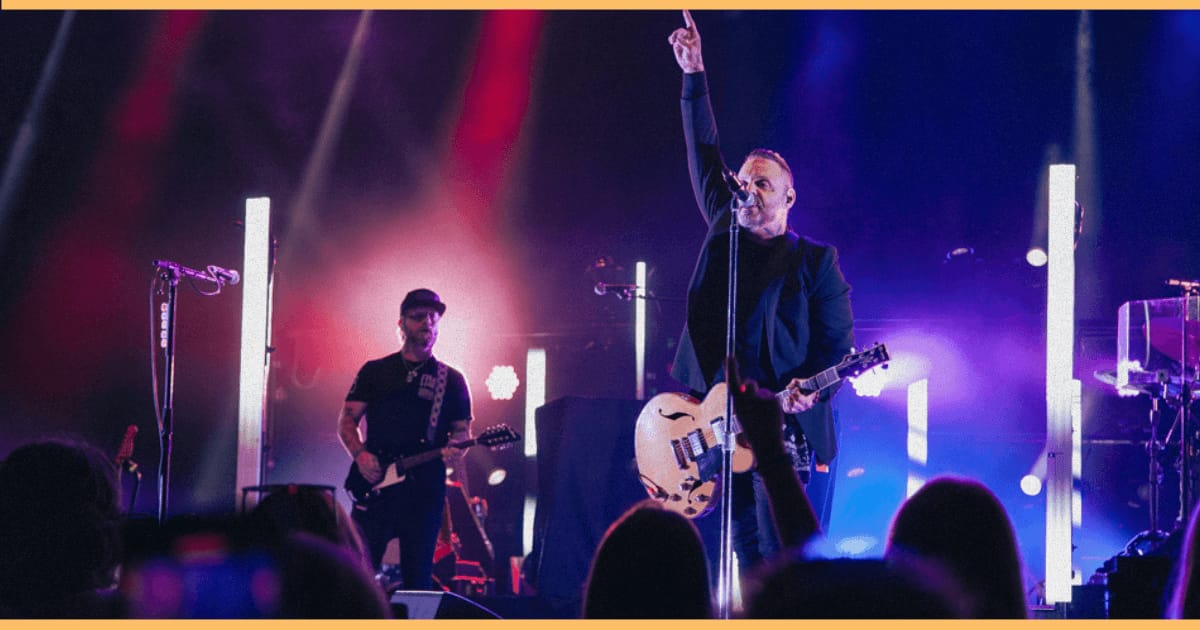 Blue October on stage performing.