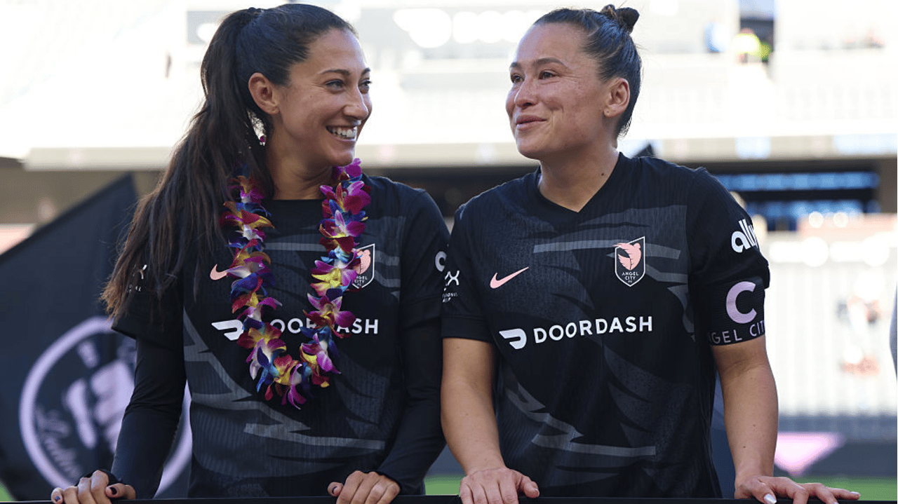 Ali Riley #5 and Christen Press #23 of Angel City FC react in their retirement ceremony after the NWSL match between Angel City FC and Portland Thorns at BMO Stadium on October 19, 2025 in Los Angeles, California.