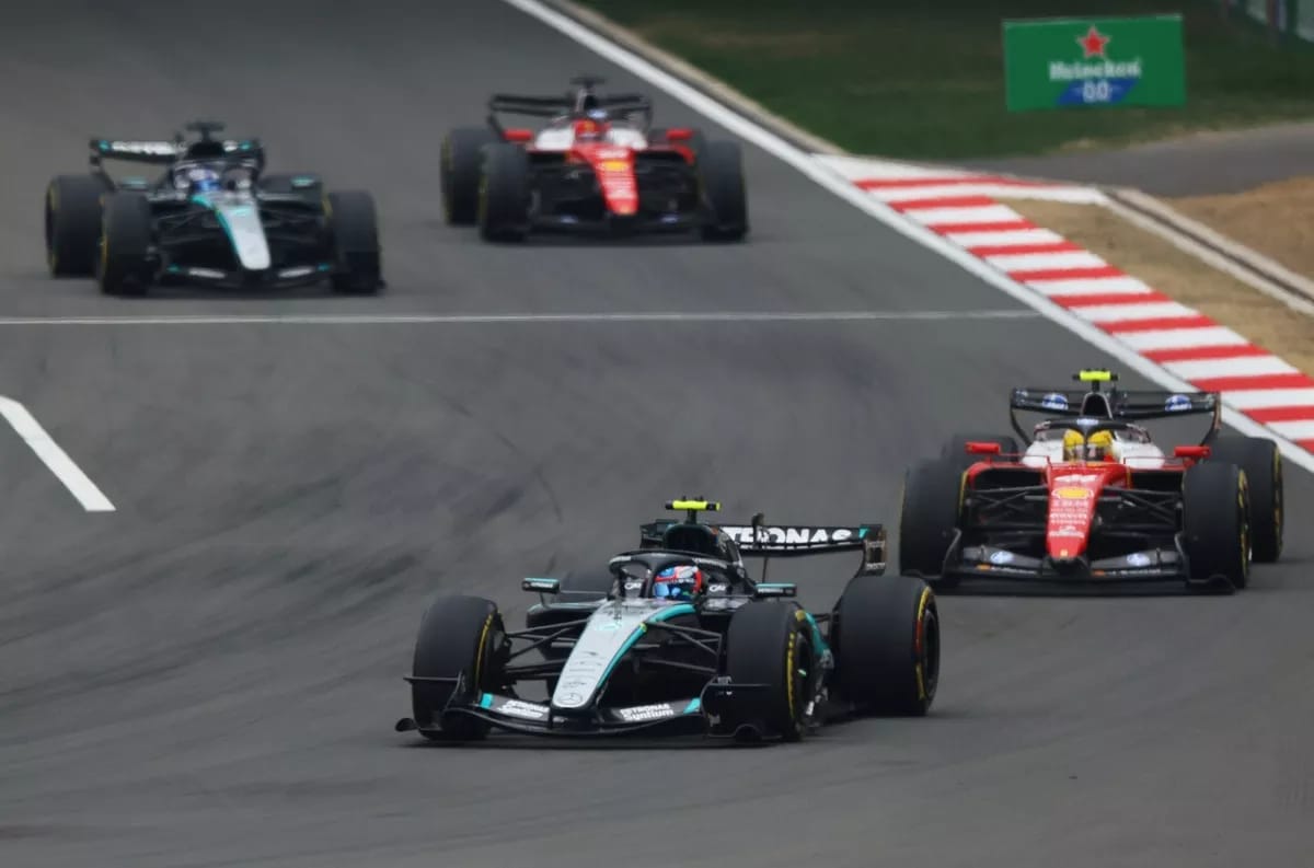 Mercedes and Ferrari F1 cars
