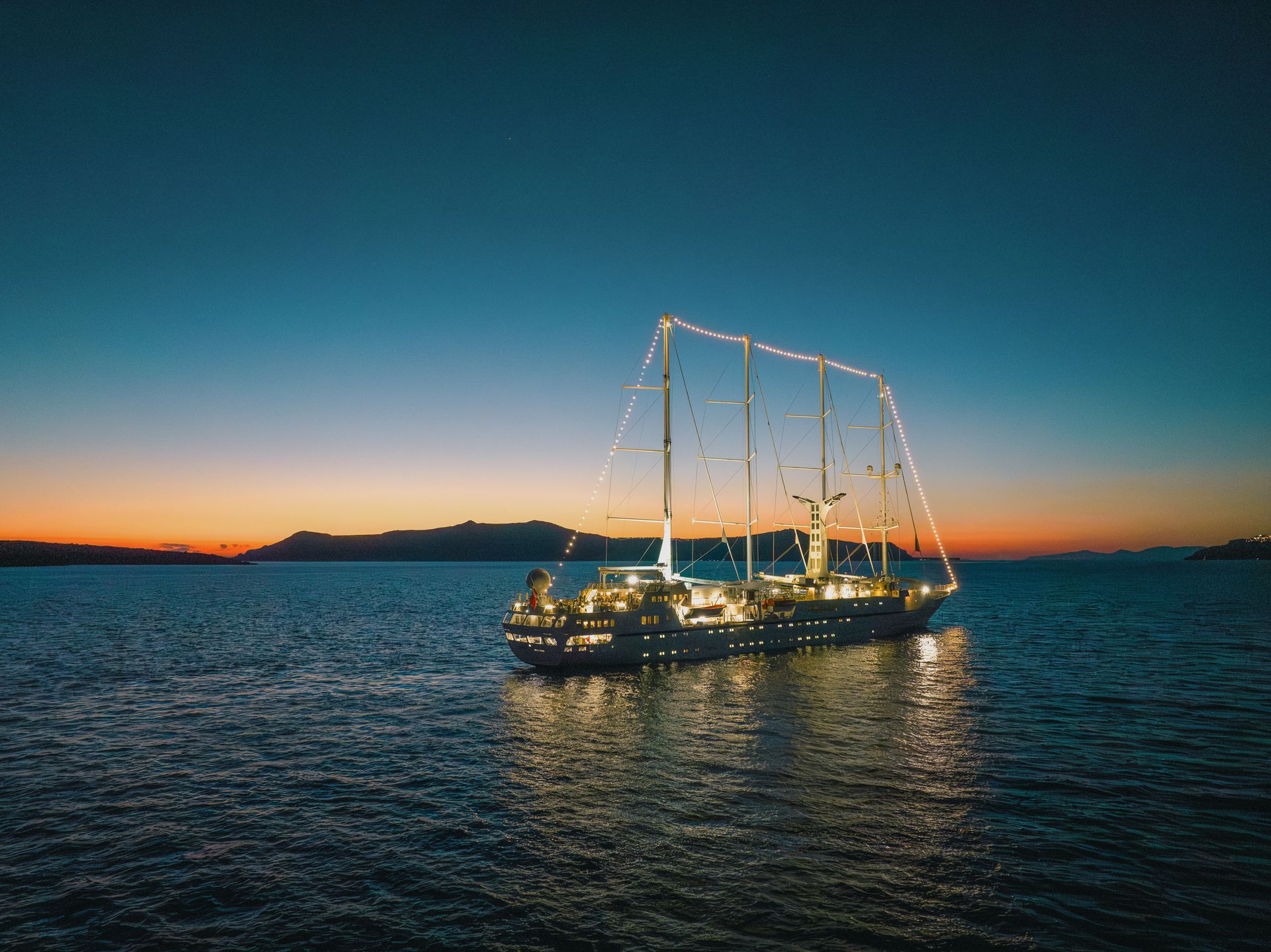 Sailing boat at sunset