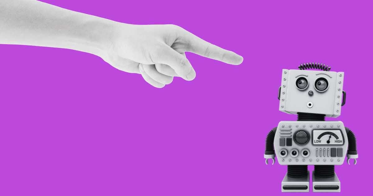 Human hand pointing accusingly at a retro-style white robot with large eyes against a bright purple background,