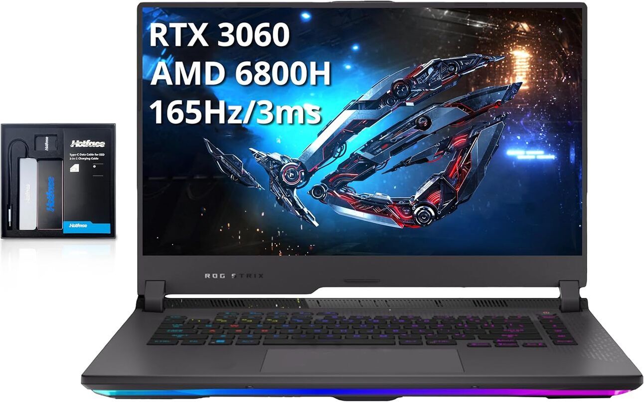 ASUS ROG Strix G15 – The Compact Powerhouse A compact black and red gaming desktop with sharp ROG branding and RGB accents, fitting snugly on a small desk setup next to a laptop and gaming mouse.
