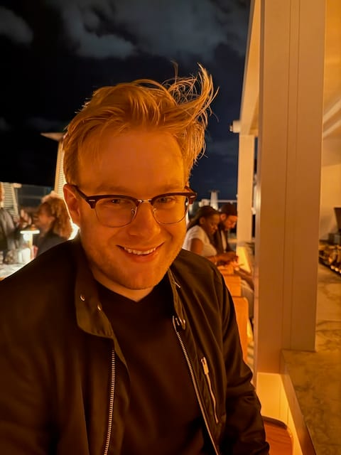 Don’t mind the hair - it gets windy on this rooftop