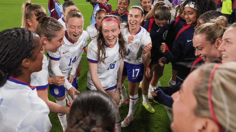 Rose Lavelle #16 of the United States addresses the huddle prior to playing Italy during an international friendly