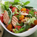 Chicken salad with roasted vegetables and mixed greens