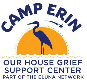 Logo for Camp Erin, Our House Grief Support Center, part of the Eluna Network. The image features a blue heron standing in front of an orange sunset with rippling water below and a shooting star above.