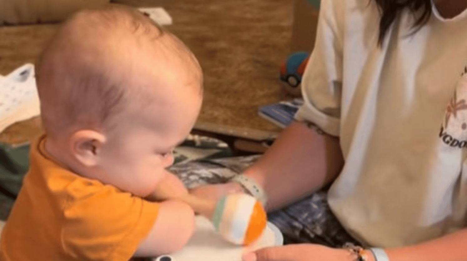 Born without hands or feet, this baby does things his own way, including playing the drum.