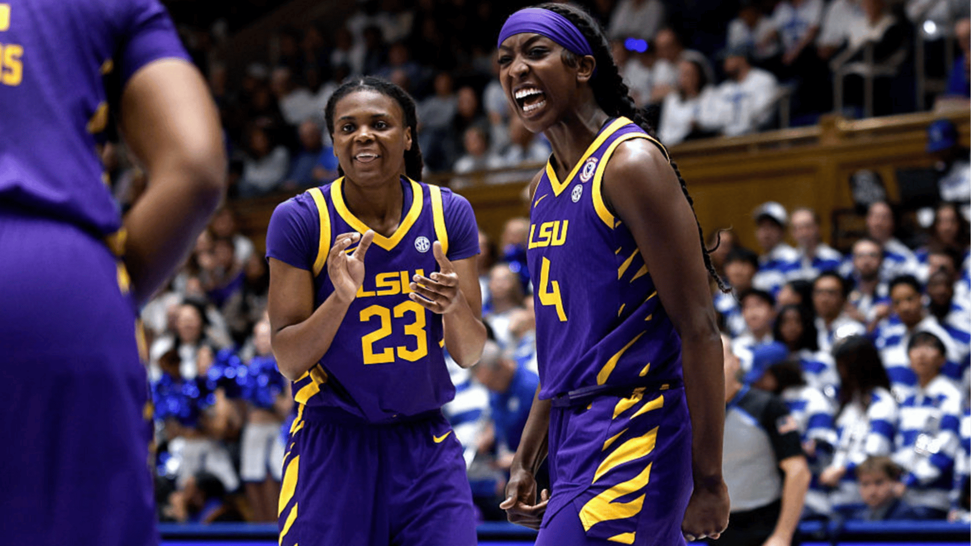Milaysia Fulwiley #23 and Flau'Jae Johnson #4 of the LSU Tigers react in the first half against the Duke Blue Devils