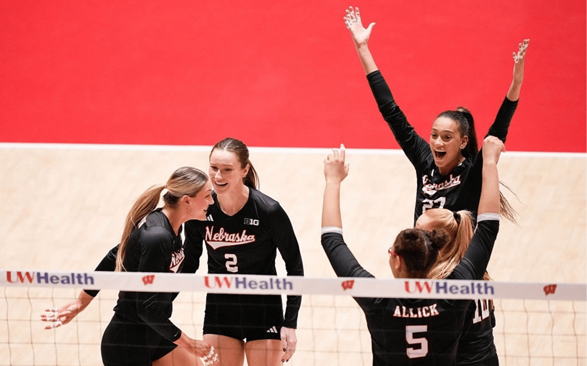  Nebraska Cornhuskers teammates, from left, Andi Jackson, Bergen Reilly #2, Rebekah Allick #5, Olivia Mauch #10 and Harper Murray #27 react to scoring 