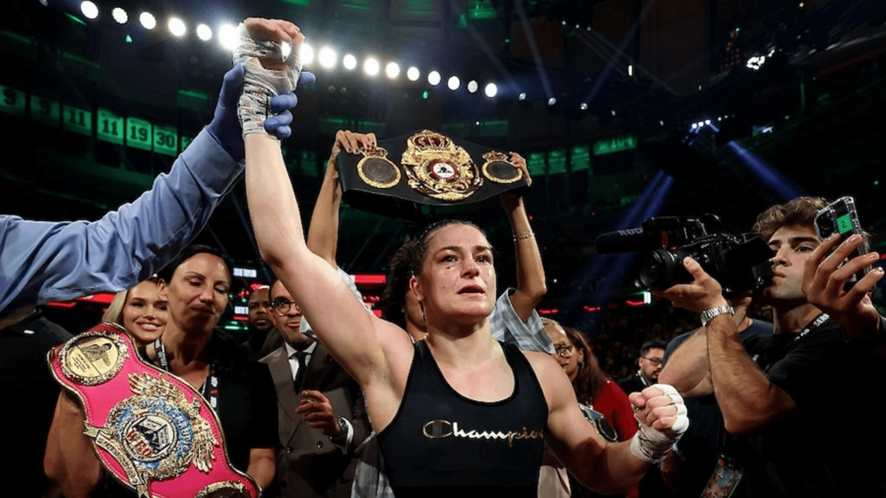Katie Taylor celebrates after defeating Amanda Serrano by a majority decision