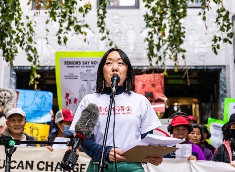 Jade Ho speaks in front of City Hall 