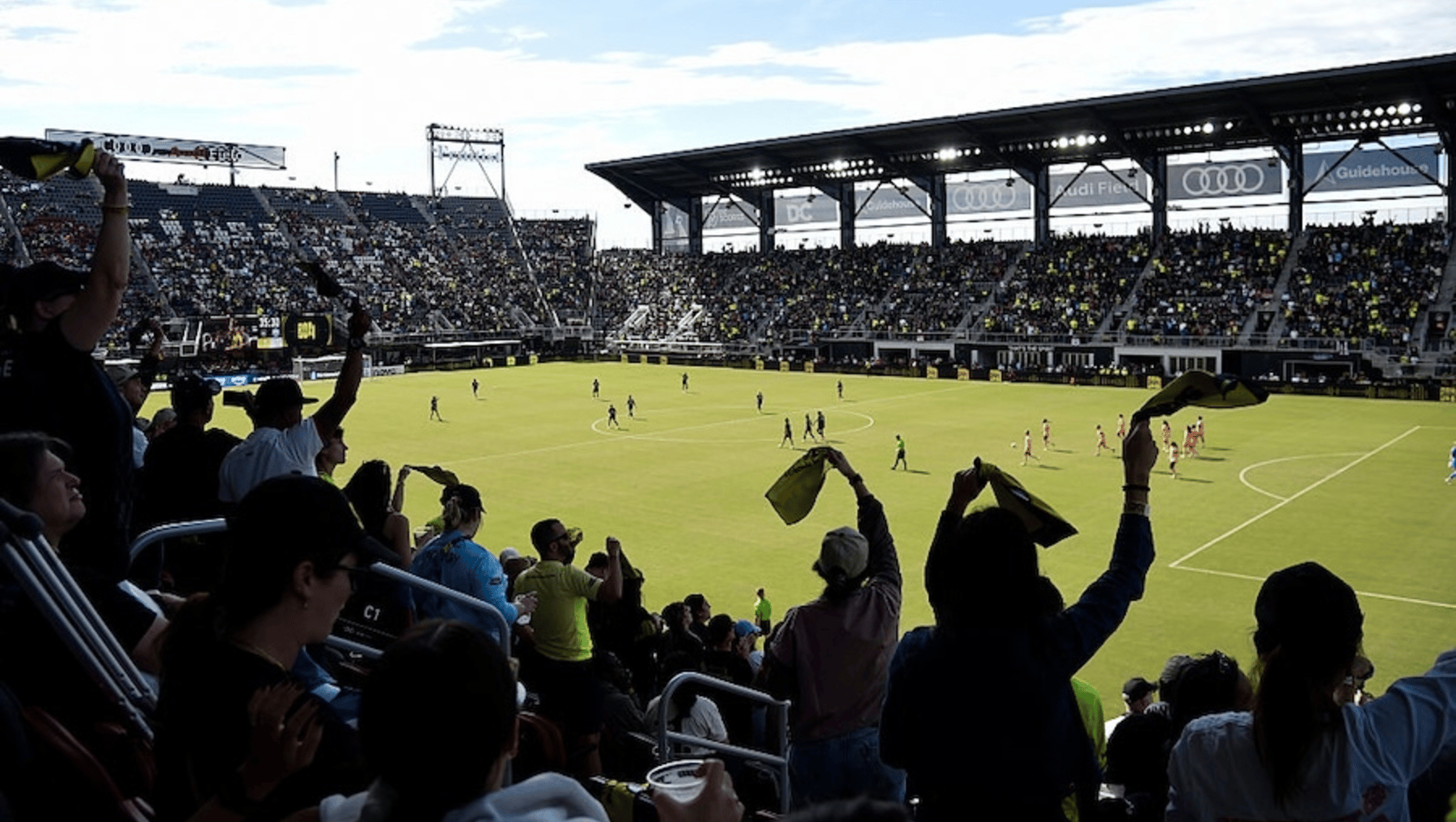 Fans cheer during the NWSL match between Washington Spirit and Orlando Pride at Audi Field