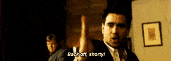 Colin Farrel in a karate pose saying "Back of shorty"