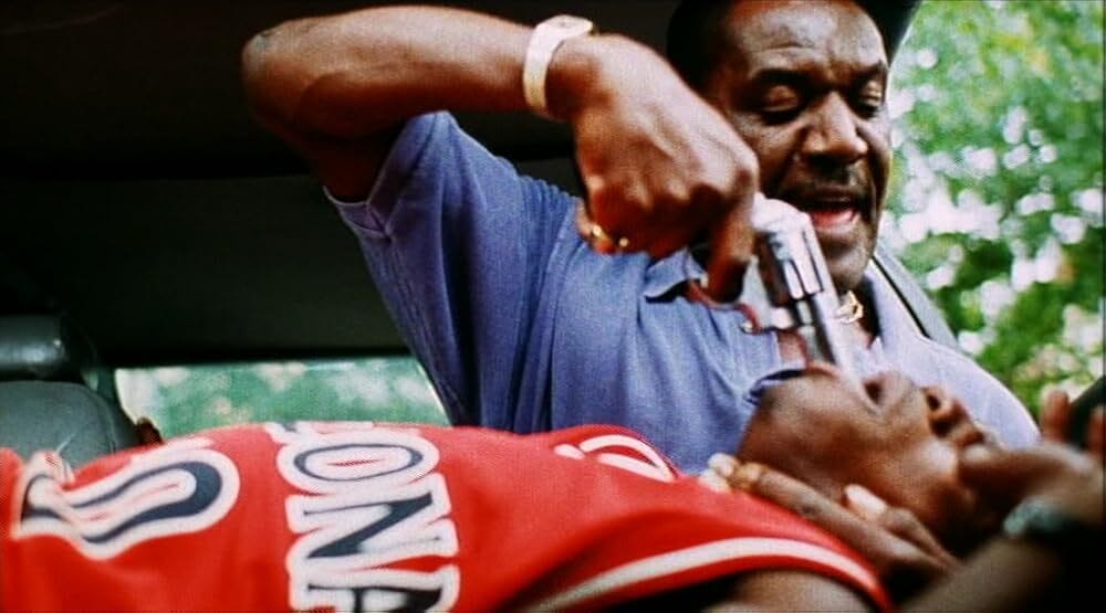 Delroy Lindo as Rodney, a drug lord, in a tense moment from Clockers, a Spike Lee crime drama set in a Brooklyn housing project.