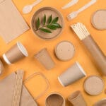 Eco-friendly Tableware - Kraft Paper Food Packaging Over Orange